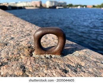 Mooring ring on the parapet of the granite embankment - Shutterstock ID 2035044605