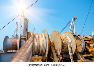 Mooring Rope In Line Bundle Of Winch Holding Strain The Ship Attract Safety To The Port Wharf Terminal, Safety Equipment Along Side The Ship To The Port Wharf