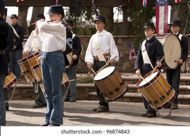 MOORPARK, CA - NOV 13: Mountain Fife and Drums perform at "The Blue & The Gray" event on Nov 13, 2011 in Moorpark, CA. Its the largest Civil War reenactment in the West. - Shutterstock ID 96874843