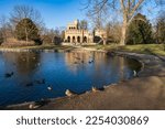 The Moosburg in the castle park of Wiesbaden-Biebrich - Germany in spring and in front of it a pond and ducks