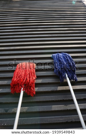 A mop in a low angle.