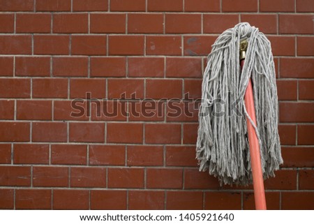 A mop on the wall