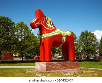 Mora, Sweden June 7, 2012: A wooden sculpture of a dalecarlian horse (wooden horse), traditionally painted and decorated. The dalecarlian horse is a symbol of the province of Dalarna.