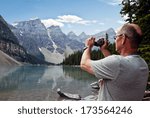 Moraine Lake, a glacially-fed lake in Banff National Park, Alberta, Canada, situated in the Valley of the Ten Peaks. Surrounded by the snow covered peaks of the Rocky Mountains.