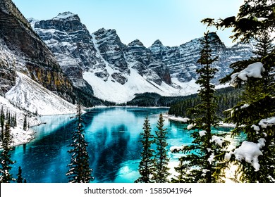 Moraine Lake Panorama In Winter With Frozen Water And Snow Covered Mountains, Banff National Park, Alberta, Canada