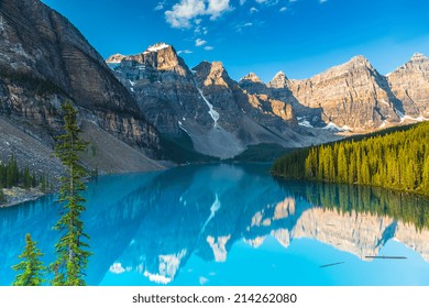Moraine Lake at Sunrise in summer at the banff national park canada - Shutterstock ID 214262080