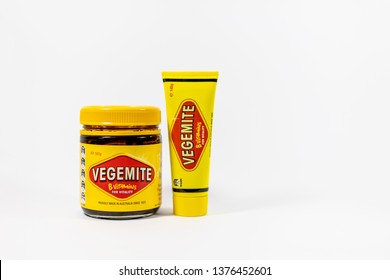 Morayfield, Queensland/Australia - April 19 2019: A jar and a squeeze tube of Vegemite side by side, isolated on a white background