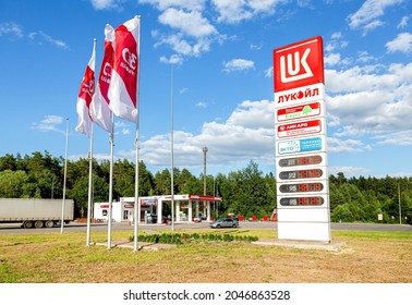 Mordovia, Russia - July 6, 2021: Lukoil Gas Station With Fueling Cars. Lukoil Is One Of The Largest Russian Oil Companies