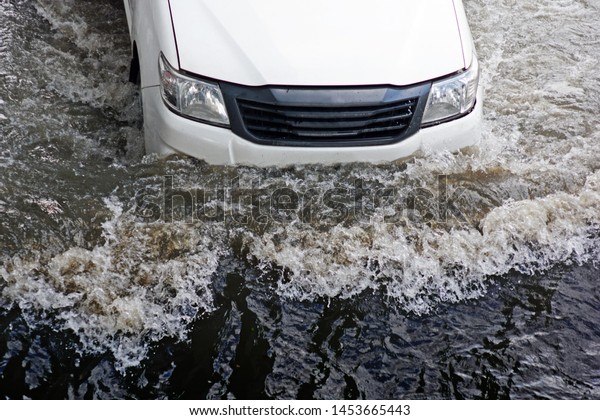 more floods and flooded\
cars