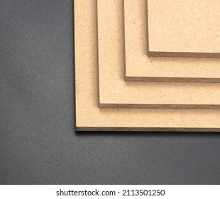 More Raw Square Mdf Boards, On A Black Background.