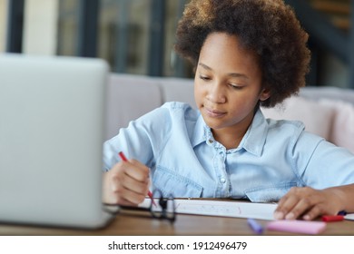 More Time For Art. Mixed Race Teen Schoolgirl Drawing On Paper With Colorful Markers While Studying With Laptop At Home During Quarantine