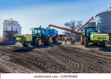 Moree, Australia - November 10, 2015: A Grain Farmer Transfers Wheat From A Silo To A Chaser Grain Bin During The 2015 Harvest.The Moree Plains Is A Major Agricultural Area In Northern New South Wales