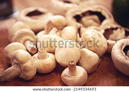 Moreish mushrooms. Shot of mushrooms on a kitchen tabletop.