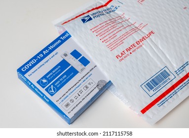 Morgantown, WV - 2 February 2022: Delivery Of The Federally Supplied At-home Test For Covid-19 With US Postal Service Envelope