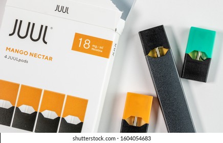 Morgantown, WV - 2 January 2020: Juul Mango Nectar Flavored Nicotine Vaping System Banned In The USA