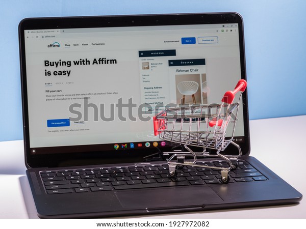 Stock photo of Buying now and paying later app Affirm with shopping cart