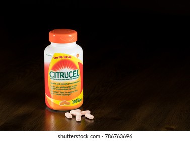 MORGANTOWN, WV - 4 JANUARY 2017: Citrucel Cellulose Fiber Supplement And Bottle On Wooden Table