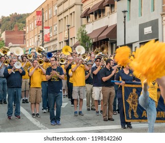 MORGANTOWN, WV - 5 OCTOBER 2018: Homecoming Parade Down Main Street Of Morgantown With Alumni Marching Band