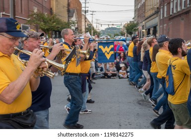 MORGANTOWN, WV - 5 OCTOBER 2018: Homecoming Parade Down Main Street Of Morgantown With Alumni Marching Band