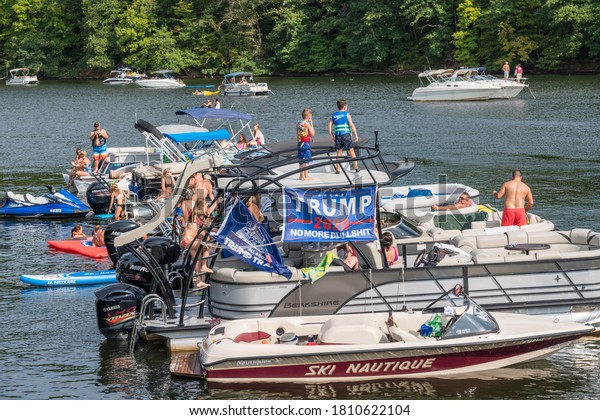 Editorial stock photo of boaters supporting Donald Trump while partying on lake in West Virginia
