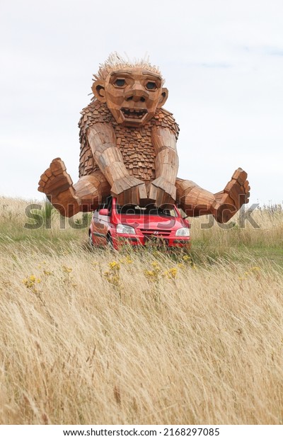 Morke, Denmark - July\
25, 2020: Sigurd, the bird and the red thing statue from Thomas\
Dambo in Morke, Denmark