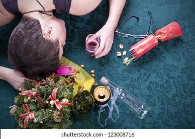 Morning After Christmas Party, Woman Asleep On Table With Alcohol At Christmas