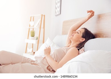 Morning of beautiful young woman in bedroom - Shutterstock ID 1489860134