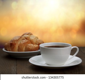 Morning Breakfast - Coffee And Croissant In Sunrise