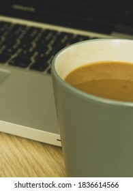 Morning Coffee In Front Of The Computer