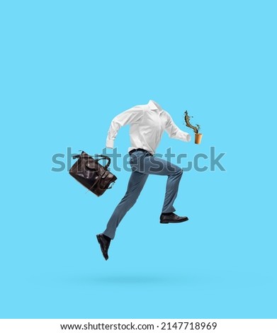 Morning coffee. Portrait of invisible man wearing modern business style outfit running, jumping isolated on blue background. Concept of fashion, creativity, art and ad. Invisible being. Contemporary
