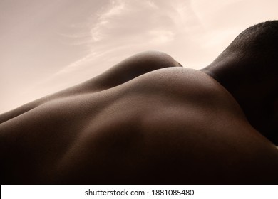 Morning. Detailed Texture Of Human Skin. Close Up Of Young African-american Male Body Surface Like Landscape With The Sky On Background. Skincare, Bodycare, Healthcare, Inspiration, Fantasy Artwork.