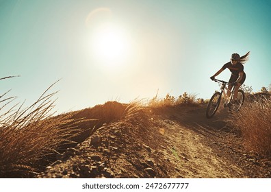 Morning, extreme cycling and mountain bike with fitness, training and sport on hill and dirt path. Bicycle, person and cardio of athlete with cyclist and exercise for race workout outdoor with mockup - Powered by Shutterstock