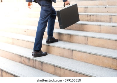 Morning Of The First Working Day Businessman Walking Up The Stairs In A Rush Hour To Work. Hurry Time.