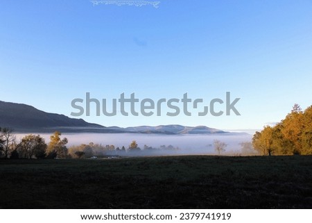 Morning fog and crisp mountain air makes a perfect early fall sunrise