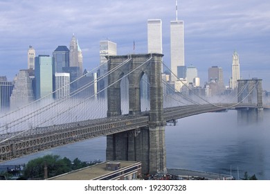 Morning Fog Over The Brooklyn Bridge Looking Into Manhattan, NY