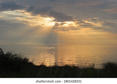 Morning God Light Over A Lake