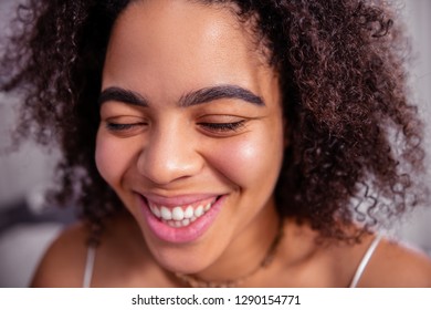 Morning At Home. Curly African American Woman With Thick Bushy Brows Being Happy With Herself And Her Life