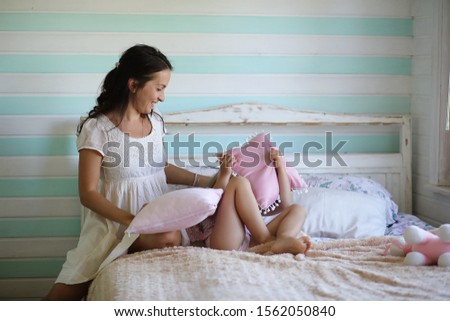 Similar – Image, Stock Photo Pregnant woman looking baby girl body