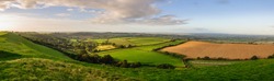 Morning Light Illuminates The Landscape Of The Somerset Levels Viewed From Corton Beacon Hill In South Somerset, England.