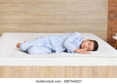 Morning Of Little Boy Sleeping On Comfortable Mattress