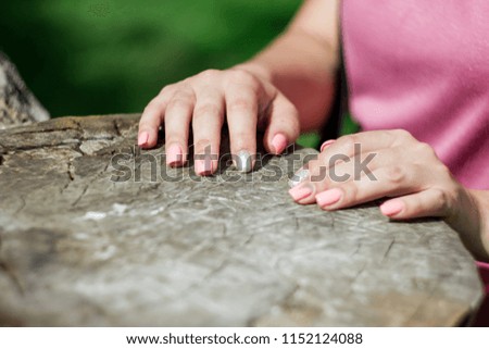 Similar – a woman and a child show their nail polish