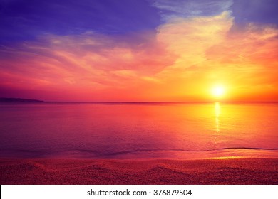 Morning on the beach. Magical sunrise over sea