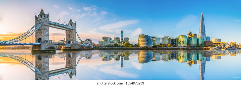 Morning panorama of London Tower Bridge with reflection 