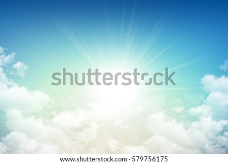Morning sky background, sun rising through white clouds