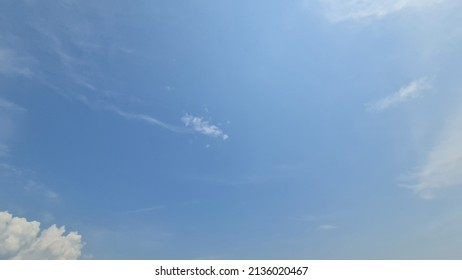 The Morning Sky At The Beginning Of The Dry Season Was A Beautiful Clean Blue With Only A Few White Streaks Of Clouds. 