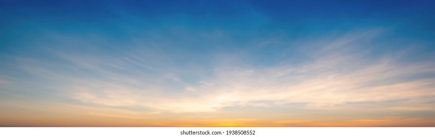 The morning sky looked like a bright golden sky. The sunrise is decorated with clouds in various shapes. Looks beautiful. - Powered by Shutterstock