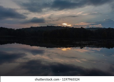 The Morning Sky Reflects Off The Lake At Lackawanna State Park.