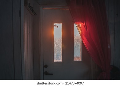 The Morning Sun Breaking Through The Opened Door Of A Cozy Cottage In Sweden Jämtland (Lapland).