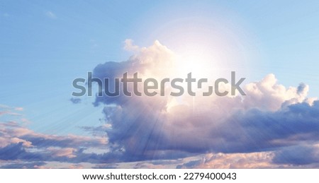 Morning sun shining through the clouds in the beautiful blue sky. nature landscape background