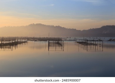 Morning sunrise Fishing nets and nature's wonders - Powered by Shutterstock